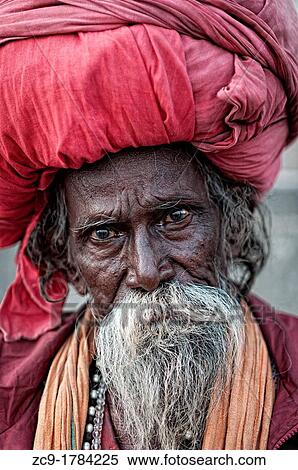 Old sadhu wearing a big turban Varanasi, India View Large Photo Image Stock Photography - Old sadhu wearing a big turban Varanasi, India. Fotosearch