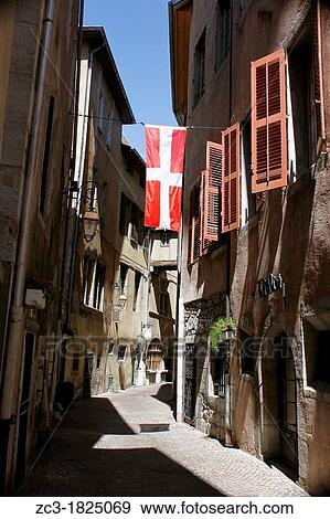 Old street with Savoyard flag near the castel of Chamb? ry, Savoie, Rh? ne-Alpes, France. View Large Photo Image Stock Photo - Old street with Savoyard flag near the castel of Chamb? ry, Savoie, Rh? ne-Alpes, France.. Fotosearch