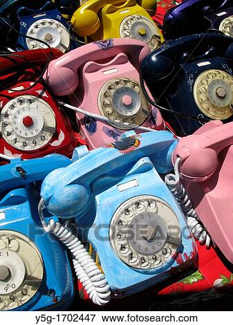 old style telephones for sale on bric a brac antique market stall View Large Photo Image Stock Photo - old style telephones for sale on bric a brac antique market stall. Fotosearch