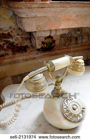 Old telephone, antiquity. View Large Photo Image Picture - Old telephone, antiquity.. Fotosearch
