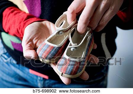 Old tiny shoes View Large Photo Image Stock Image - Old tiny shoes. Fotosearch