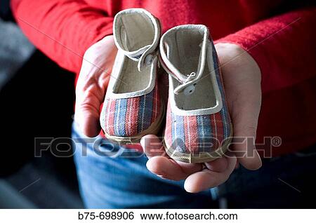 Stock Photograph - Old tiny shoes. Fotosearch