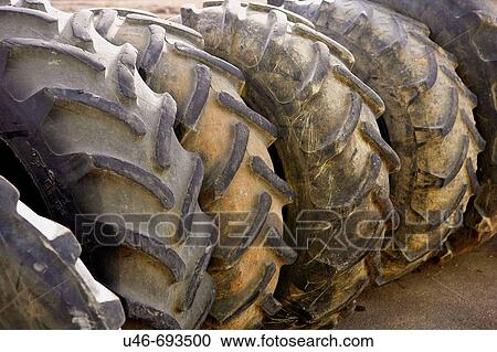 Stock Image - Old tractor tyres. Lleida, Catalonia, Spain. Fotosearch