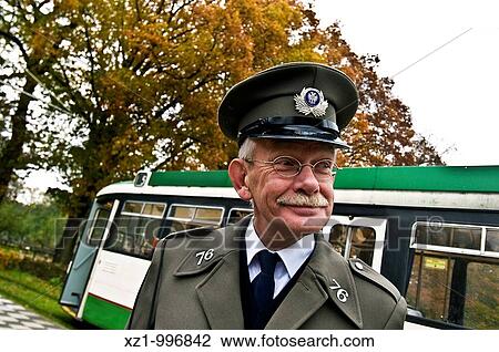 Stock Image - Old tram line driver at open air museum, Arnhem, the Netherlands. Fotosearch