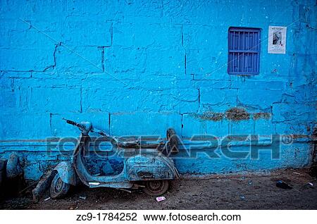 Old Vespa motorbike parked in front of a blue painted wall Jodhpur, Rajasthan, India View Large Photo Image Stock Image - Old Vespa motorbike parked in front of a blue painted wall Jodhpur, Rajasthan, India. Fotosearch