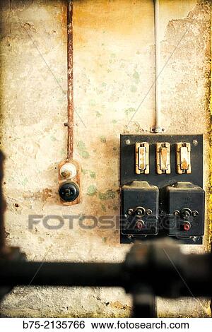 Old wall from a company with different types of electric handles and fuses in Menorca, Balearics, Spain, Europe. View Large Photo Image Stock Photograph - Old wall from a company with different types of electric handles and fuses in Menorca, Balearics, Spain, Europe.. Fotosearch