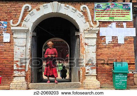 Old woman ar the entrance to Changunarayan Hindu temple, Kathmandu Valley, Nepal View Large Photo Image Stock Image - Old woman ar the entrance to Changunarayan Hindu temple, Kathmandu Valley, Nepal. Fotosearch