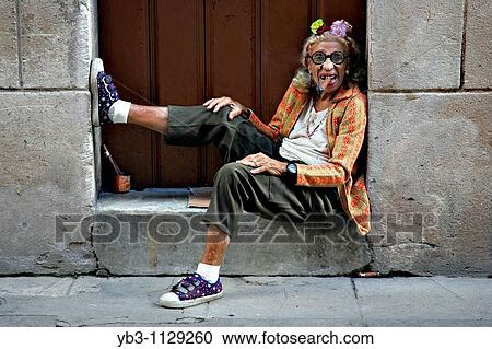 Old woman in doorway smoking a cigar, Havana, Cuba View Large Photo Image Stock Image - Old woman in doorway smoking a cigar, Havana, Cuba. Fotosearch