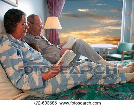 Older Couple Lounging Together on Bed View Large Photo Image Stock Photography - Older Couple Lounging Together on Bed. Fotosearch