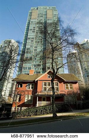 Stock Image - older house and apartment towers in the West End, Vancouver, BC, Canada. Fotosearch