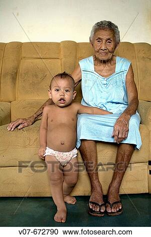 Oliana Cansen Branco, 98 years old, is the older inhabitant in Fordlandia, town created by Henry Ford (Ford founder) in Amazonia, for rubber supply. Brazil. View Large Photo Image Stock Image - Oliana Cansen Branco, 98 years old, is the older inhabitant in Fordlandia, town created by Henry Ford (Ford founder) in Amazonia, for rubber supply. Brazil.. Fotosearch