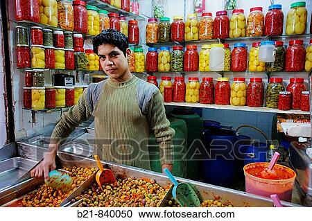Olives, red and green peppers, lemons, hot sauce, etc. in a shop of the medina, Fes, Morocco View Large Photo Image Stock Image - Olives, red and green peppers, lemons, hot sauce, etc. in a shop of the medina, Fes, Morocco. Fotosearch