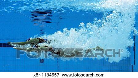 Olivia Allison and Jenna Randal of Great Britain compete in duet technical routine during the synchronished swiming event, on day ten of the 2008 Beijing Olympics View Large Photo Image Stock Photo - Olivia Allison and Jenna Randal of Great Britain compete in duet technical routine during the synchronished swiming event, on day ten of the 2008 Beijing Olympics. Fotosearch