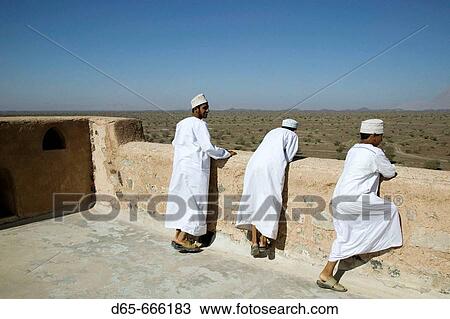 OMAN-Western Hajar Mountains-Jabrin: Jabrin Castle / Fort - Omani Students on roof View Large Photo Image Stock Image - OMAN-Western Hajar Mountains-Jabrin: Jabrin Castle / Fort - Omani Students on roof. Fotosearch