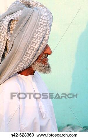 Omani fisherman, Mutrah Fish Market, Muscat, Oman View Large Photo Image Stock Photo - Omani fisherman, Mutrah Fish Market, Muscat, Oman. Fotosearch
