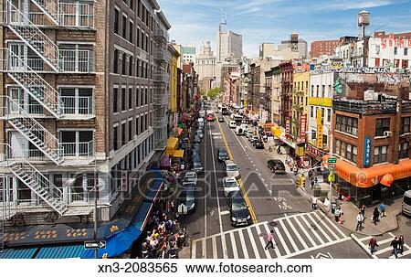 On background Freedom Tower and City Hall in Downtown, East Broadway Street from Manhattan Bridge, Chinatown, Manhattan, New York City, New York, USA. View Large Photo Image Stock Photography - On background Freedom Tower and City Hall in Downtown, East Broadway Street from Manhattan Bridge, Chinatown, Manhattan, New York City, New York, USA.. Fotosearch