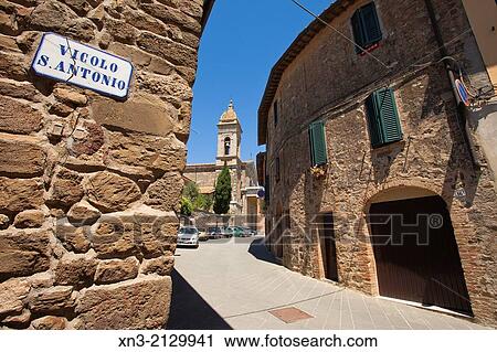 On background Montalcino Cathedral Italian: Duomo di Montalcino, Concattedrale di San Salvatore is a Roman Catholic cathedral, Montalcino, Val dOrcia, or Valdorcia, Siena Province, Tuscany, Italy, Europe. View Large Photo Image Stock Image - On background Montalcino Cathedral Italian: Duomo di Montalcino, Concattedrale di San Salvatore is a Roman Catholic cathedral, Montalcino, Val dOrcia, or Valdorcia, Siena Province, Tuscany, Italy, Europe.. Fotosearch