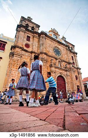 On Colombia's Caribbean coast, Cartagena is one of the jewels of south american cities One of the famous landmarks is the Santo Domingo Church, created by Colombian artist Fernando Botero in 1579 View Large Photo Image Stock Photograph - On Colombia's Caribbean coast, Cartagena is one of the jewels of south american cities One of the famous landmarks is the Santo Domingo Church, created by Colombian artist Fernando Botero in 1579. Fotosearch