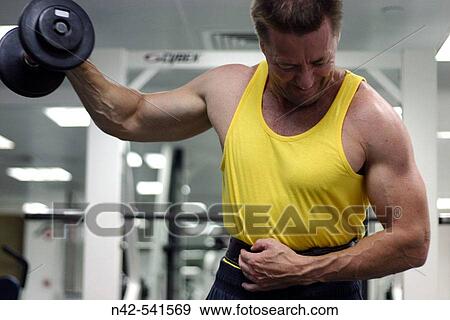 One arm dumbell shoulder fly excercise, Abu Dhabi, United Arab Emirates View Large Photo Image Stock Photo - One arm dumbell shoulder fly excercise, Abu Dhabi, United Arab Emirates. Fotosearch