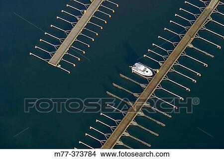 One boat at the bridge in the harbour Simrishamn Sk? ne Sweden View Large Photo Image Picture - One boat at the bridge in the harbour Simrishamn Sk? ne Sweden. Fotosearch