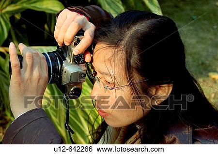 one chinese photography taking picture View Large Photo Image Stock Photograph - one chinese photography taking picture. Fotosearch