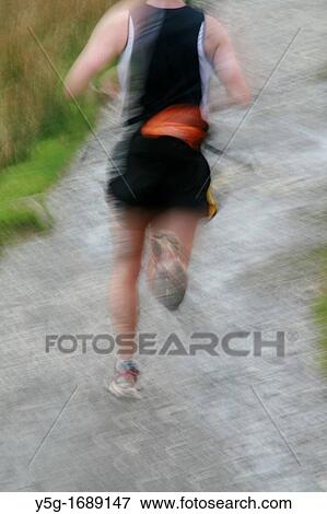 one fast man runner on mountain country path View Large Photo Image Stock Photo - one fast man runner on mountain country path. Fotosearch
