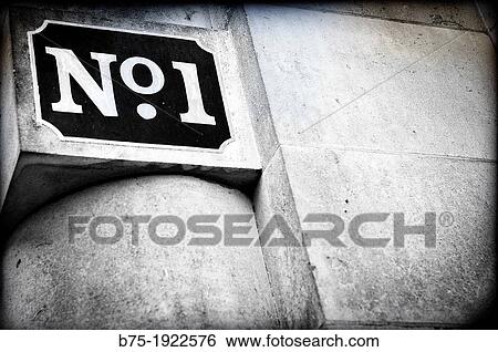 one, number one on a facade View Large Photo Image Stock Photograph - one, number one on a facade. Fotosearch