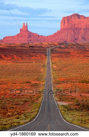 One of the most famous images of the Monument Valley is the long straight road US 163leading across flat desert towards sandstone buttes and pinnacles rock Monument Valley Tribal Park, Nabajo Nation, Arizona/Utah, USA View Large Photo Image Stock Photo - One of the most famous images of the Monument Valley is the long straight road US 163leading across flat desert towards sandstone buttes and pinnacles rock Monument Valley Tribal Park, Nabajo Nation, Arizona/Utah, USA. Fotosearch