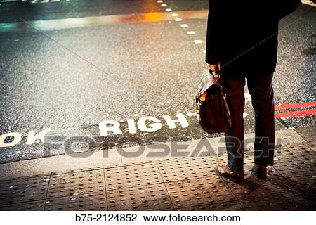 one unrecognizable executive with portfolio trying to cross the street in London, England, UK, Europe View Large Photo Image Stock Image - one unrecognizable executive with portfolio trying to cross the street in London, England, UK, Europe. Fotosearch