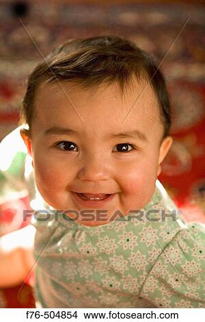 Picture - One year old baby girl (Columbian). Fotosearch