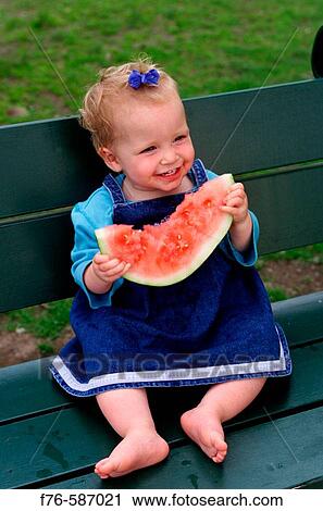 One year old baby girl eating watermelon. View Large Photo Image Stock Image - One year old baby girl eating watermelon.. Fotosearch
