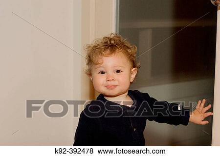 One year old boy going out a door View Large Photo Image Stock Photo - One year old boy going out a door. Fotosearch