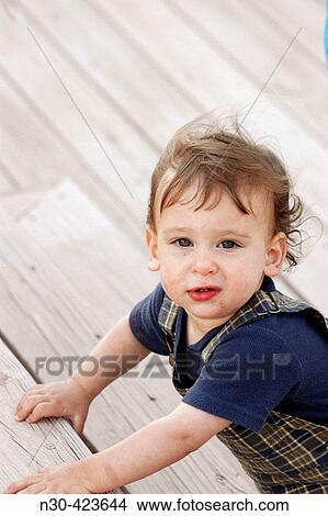 One year old boy looking up View Large Photo Image Picture - One year old boy looking up. Fotosearch