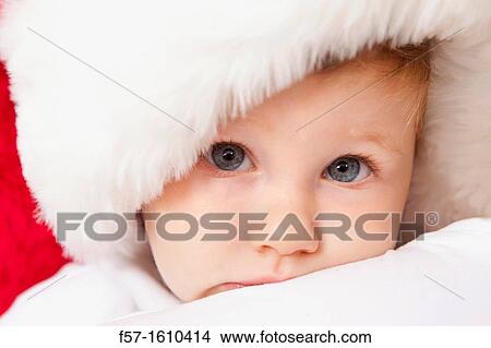 One year old boy wearing a Santa hat View Large Photo Image Picture - One year old boy wearing a Santa hat. Fotosearch