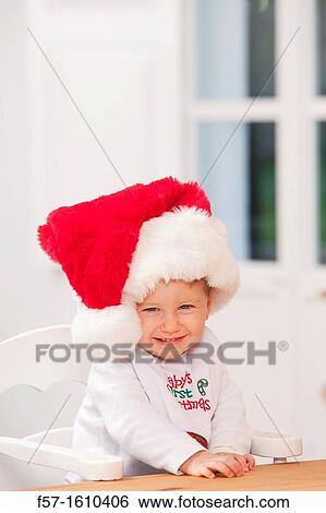 One year old boy wearing a Santa hat View Large Photo Image Stock Photograph - One year old boy wearing a Santa hat. Fotosearch