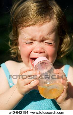 One year old girl crying. View Large Photo Image Picture - One year old girl crying.. Fotosearch