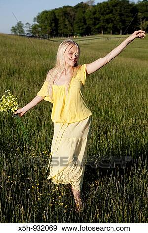 one young woman walking View Large Photo Image Stock Photo - one young woman walking. Fotosearch