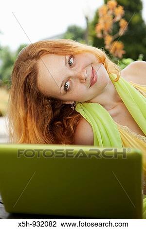 one young woman with notebook View Large Photo Image Stock Image - one young woman with notebook. Fotosearch