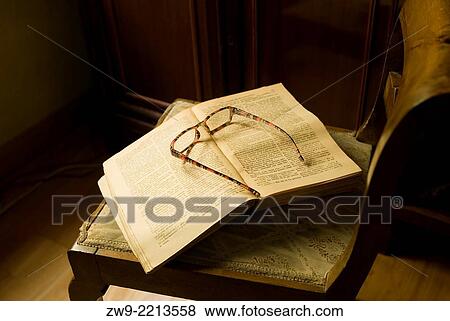 Open book and glases, Madrid. View Large Photo Image Stock Photo - Open book and glases, Madrid.. Fotosearch