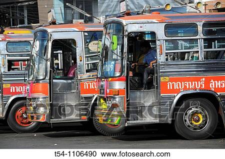Stock Image - Open Doors on Thai Buses at Kanchanaburi Terminal. Fotosearch