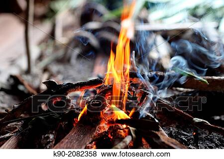 Stock Photo - Open fire, Papua, Indonesia, Southeast Asia.. Fotosearch