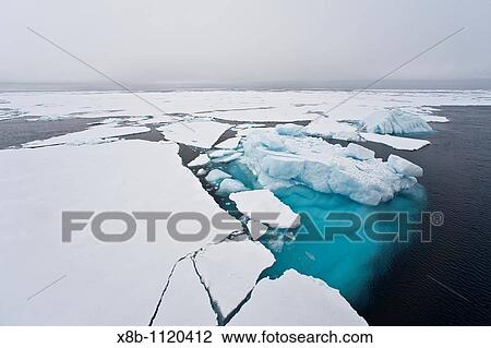 Open leads surrounded by multi-year ice floes in the Barents Sea between Edgeya Edge Island and Kong Karls Land in the Svalbard Archipelago, Norway View Large Photo Image Stock Image - Open leads surrounded by multi-year ice floes in the Barents Sea between Edgeya Edge Island and Kong Karls Land in the Svalbard Archipelago, Norway. Fotosearch