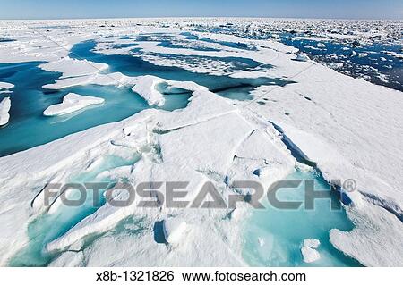 Open leads surrounded by multi-year ice floes in the Barents Sea between Edgeoya Edge Island and Kong Karls Land in the Svalbard Archipelago, Norway View Large Photo Image Stock Photograph - Open leads surrounded by multi-year ice floes in the Barents Sea between Edgeoya Edge Island and Kong Karls Land in the Svalbard Archipelago, Norway. Fotosearch