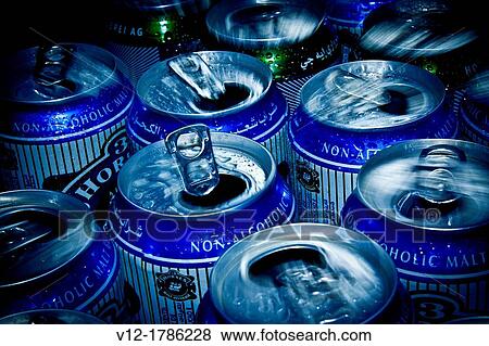 Stock Photo - Opened cans, close up. Fotosearch