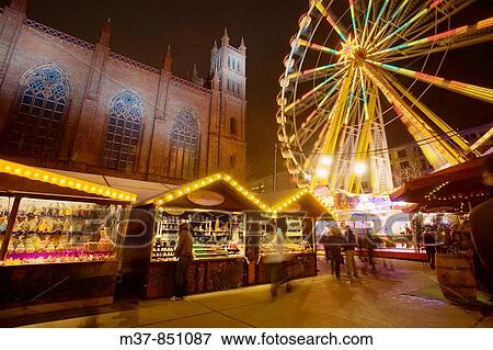Stock Photo - Opera Palace Christmas market and Friedrich Werdersche Church in background, Berlin, Germany. Fotosearch