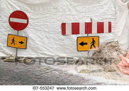 Stock Photo - Opposite pedestrian signs. Tallinn. Estonia. Fotosearch