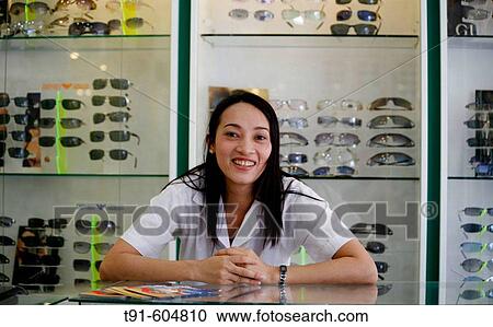 optical shop assistant in Saigon, Vietnam View Large Photo Image Stock Image - optical shop assistant in Saigon, Vietnam. Fotosearch