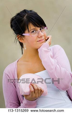 Optimistic teen woman with glasses View Large Photo Image Stock Photo - Optimistic teen woman with glasses. Fotosearch