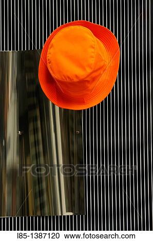 Stock Image - Orange hat hook. Fotosearch