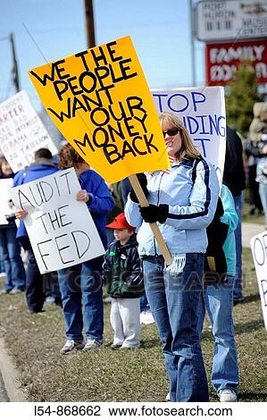 Ordinary citizen protestors protest taxes and other government wasteful spending View Large Photo Image Stock Image - Ordinary citizen protestors protest taxes and other government wasteful spending. Fotosearch